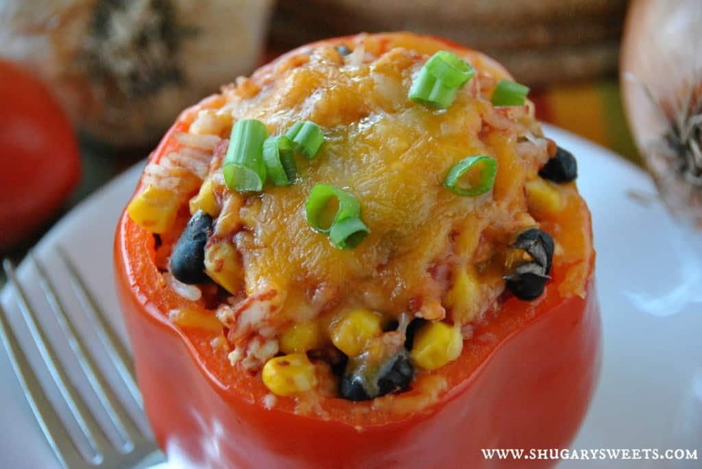 Santa Fe Stuffed Peppers: a healthy dinner made with ground turkey. Lots of flavor! #stuffedpeppers #healthy #dinner www.shugarysweets.com