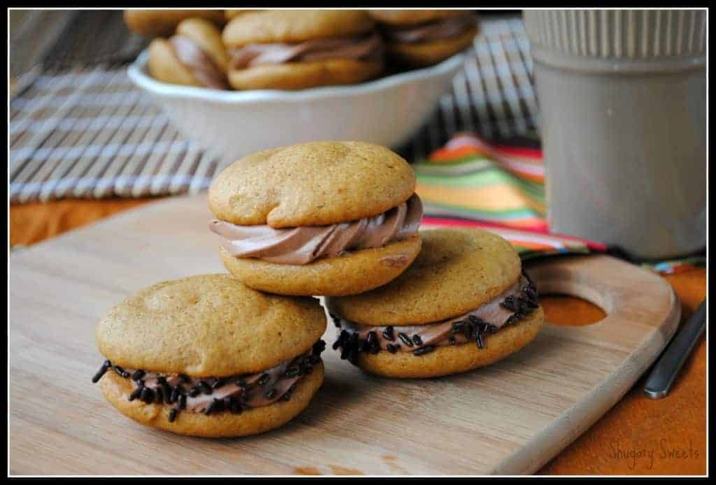 Pumpkin Whoopie Pies with Chocolate Cream Cheese Filling- so moist and delicious, you will crave these all year long #pumpkin www.shugarysweets.com Pumpkin Whoopie Pies with Chocolate Cream Cheese Filling- so moist and delicious, you will crave these all year long #pumpkin www.shugarysweets.com