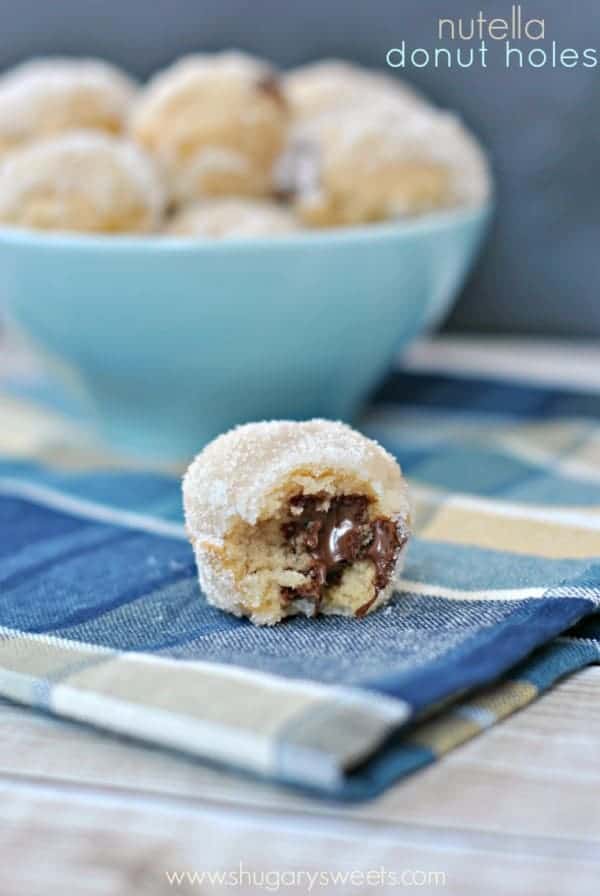 Nutella Stuffed Donut Holes: bite sized sugar coated donut holes filled with nutella!