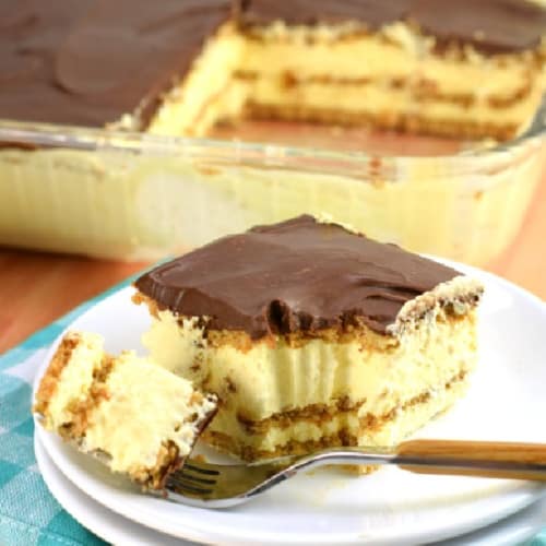 Slice of eclair cake with a bite taken out.
