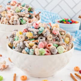 White trash candy mix in a white serving bowl.