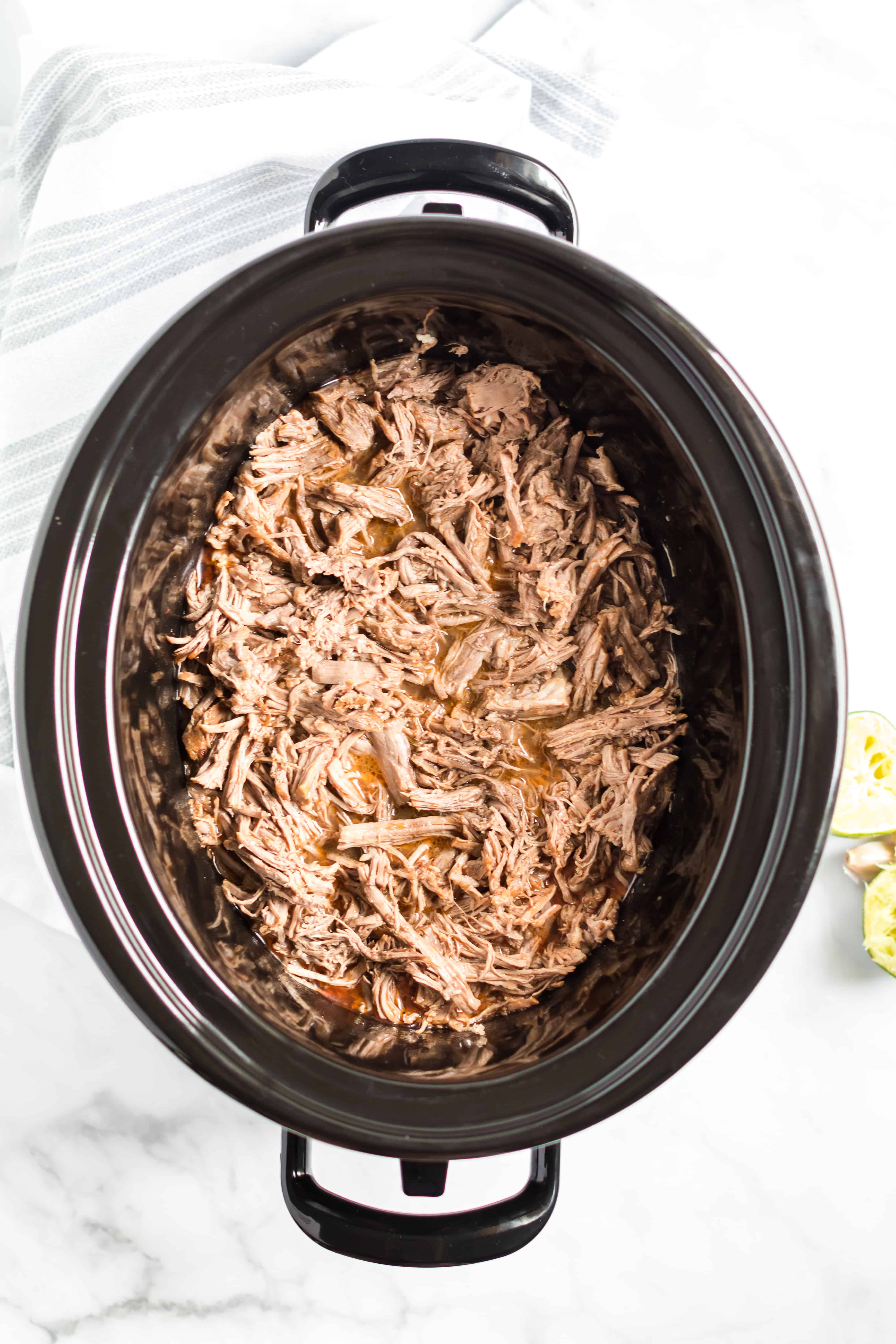 Shredded Beef Barbocoa in crockpot.