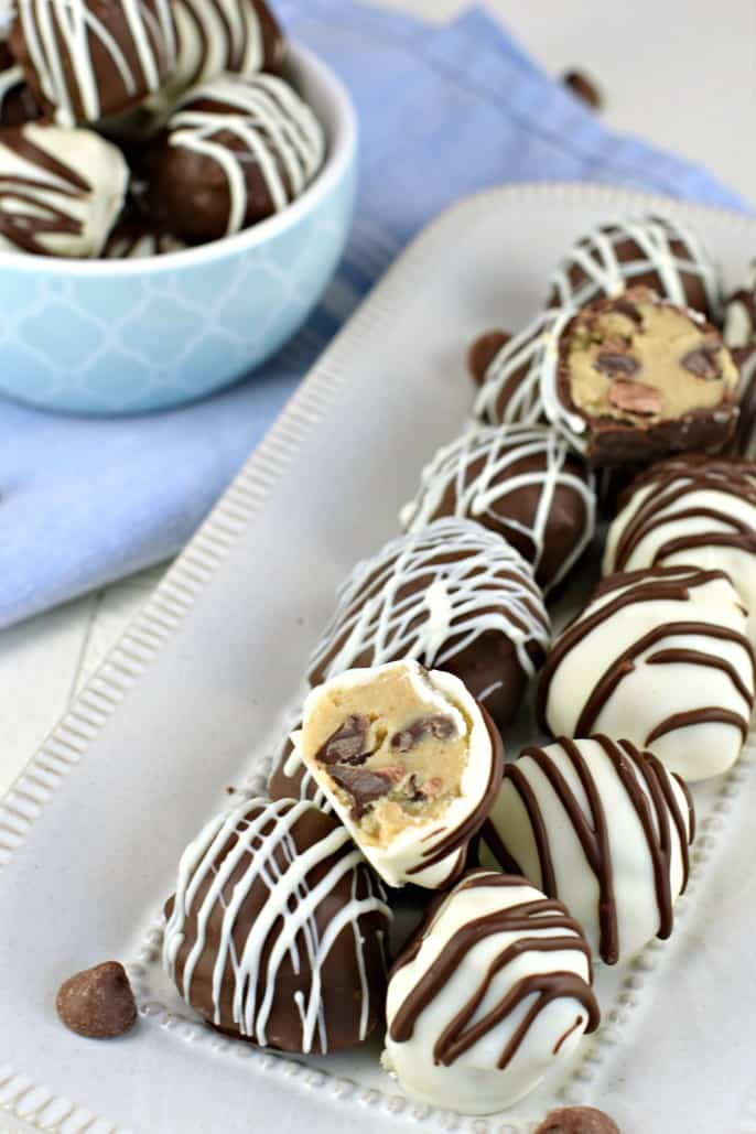 Plate and Bowl of Chocolate chip cookie dough truffles with blue napkin