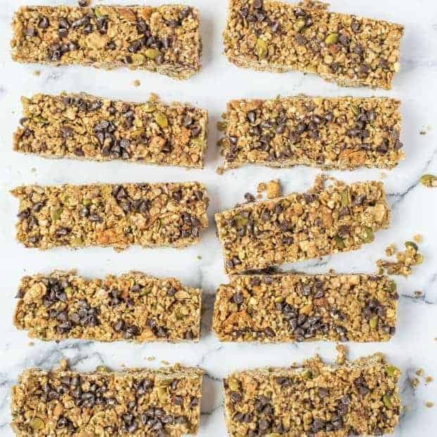 White marble counter with rectangle cut granola bars.