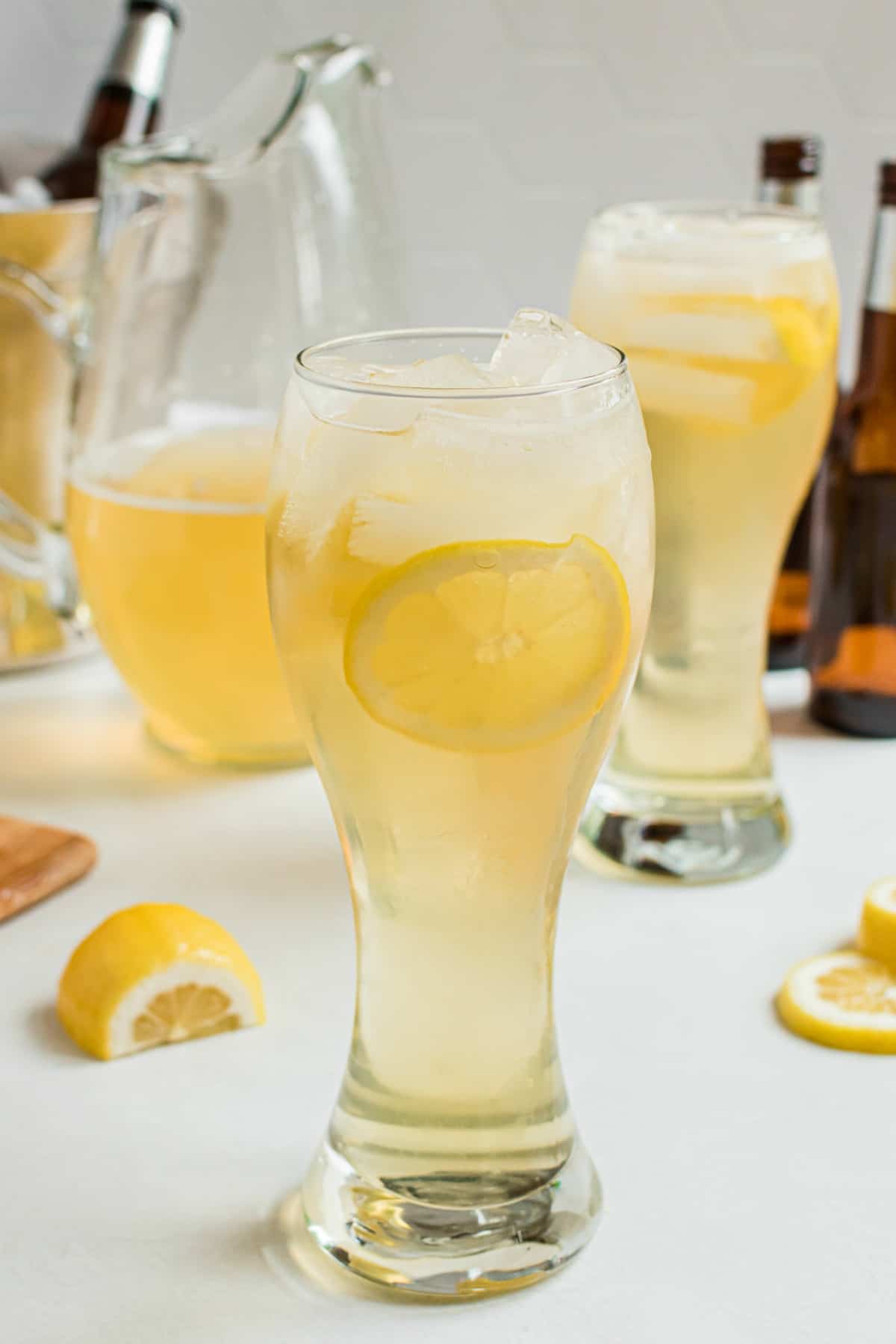 Pilsner glass with lemon shandy made from scratch.