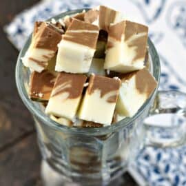 Clear mug filled with pieces of root beer float mug.