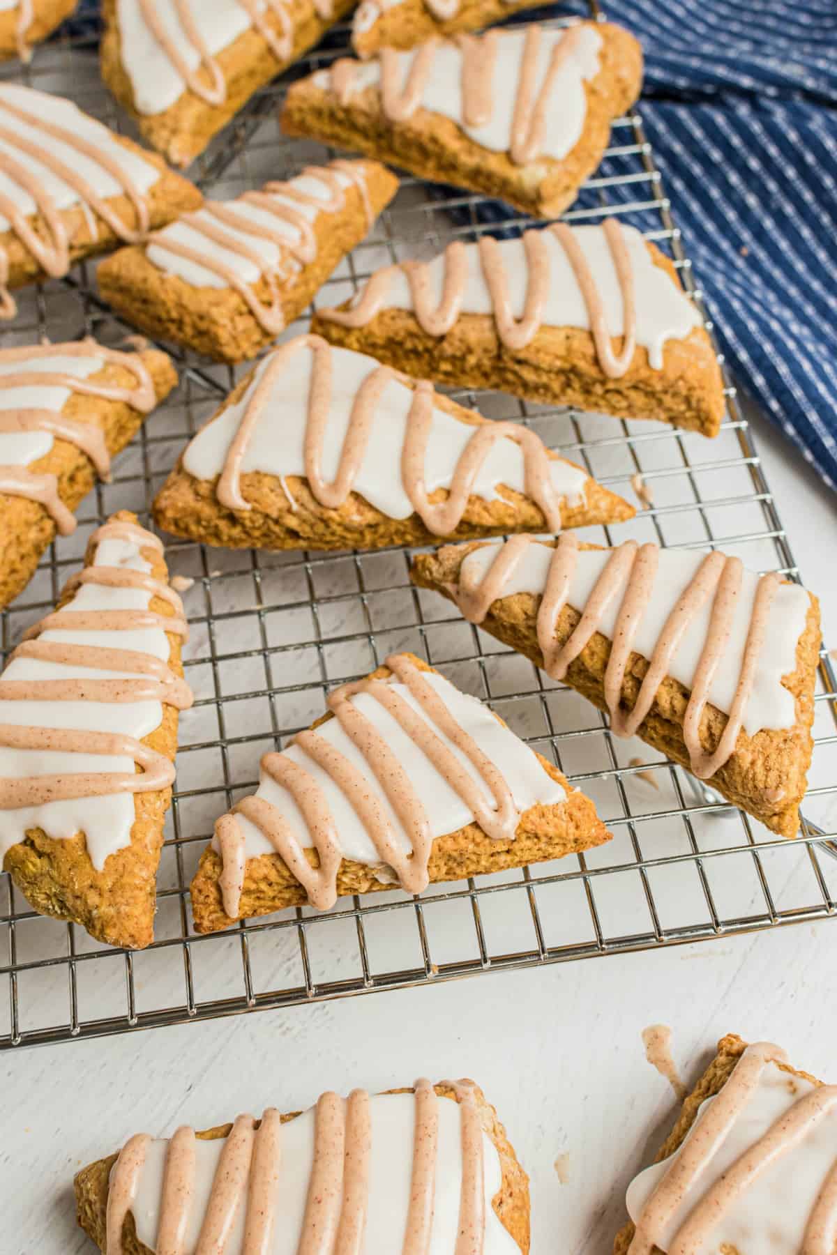 Pumpkin scones on a wire rack.