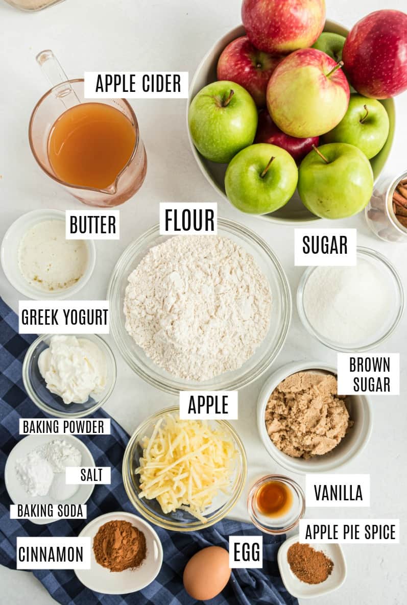 Ingredients needed to make apple cider donuts, including fresh apples, cider, and sugar.