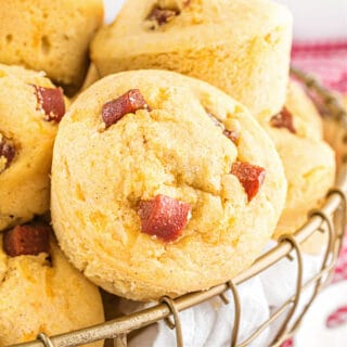 Corn dog muffins in a wire basket.