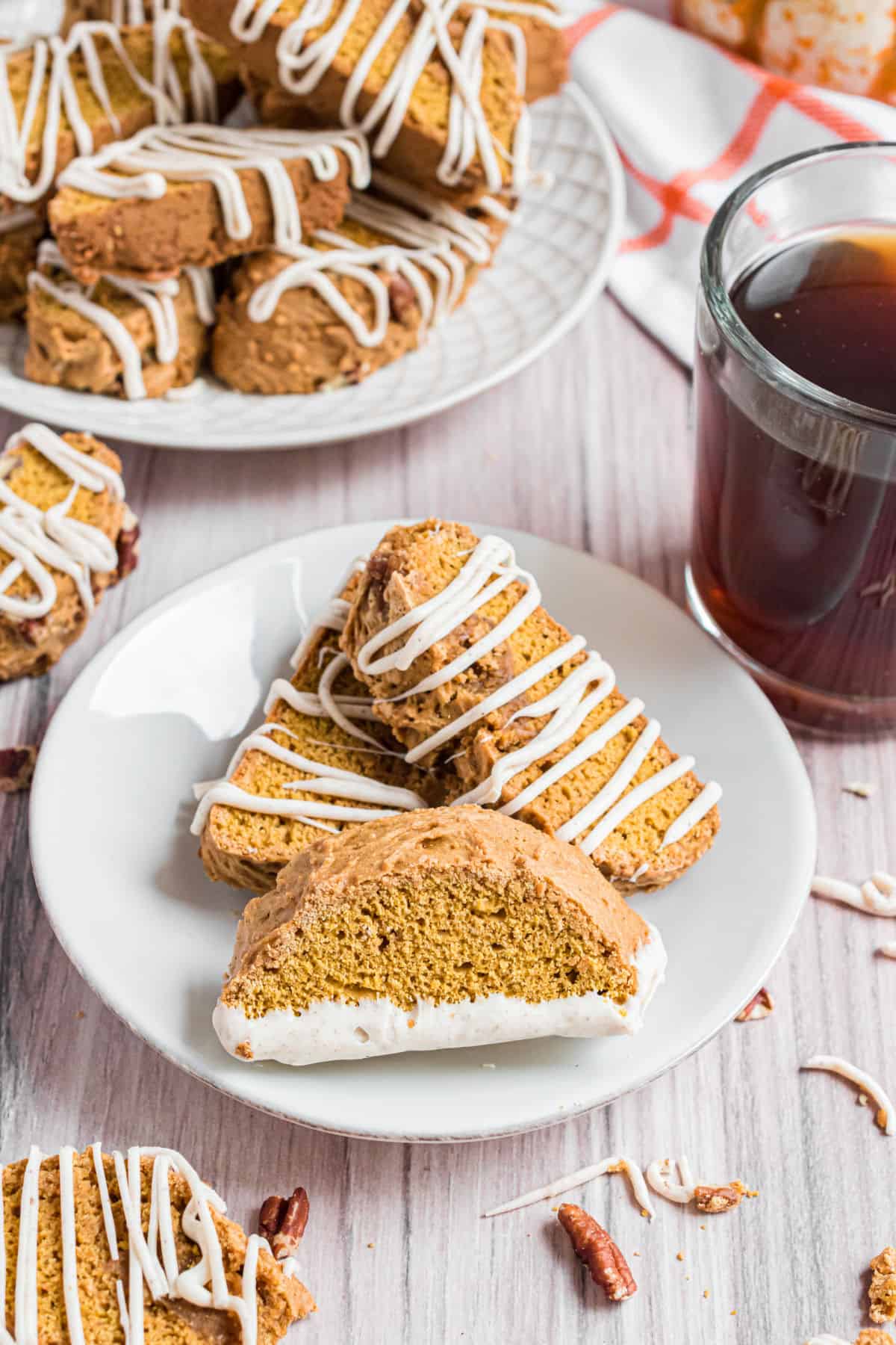 Pumpkin biscotti on a white plate.