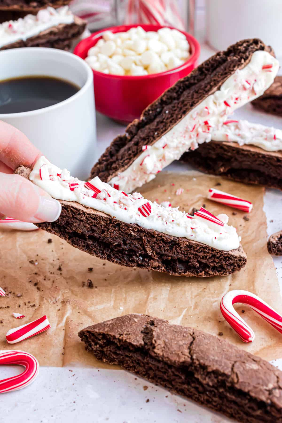 Chocolate biscotti getting ready to dip in coffee.