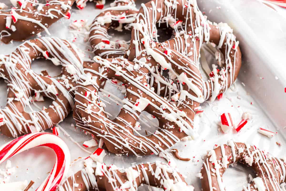 Pretzels dipped in chocolate then drizzled with white chocolate and crushed candy canes.