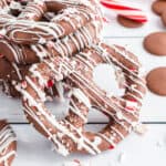Chocolate Covered Peppermint Pretzels make the holidays sweeter! Make these peppermint bark pretzel candies to show someone special that you care. Don't forget to save a few for yourself!