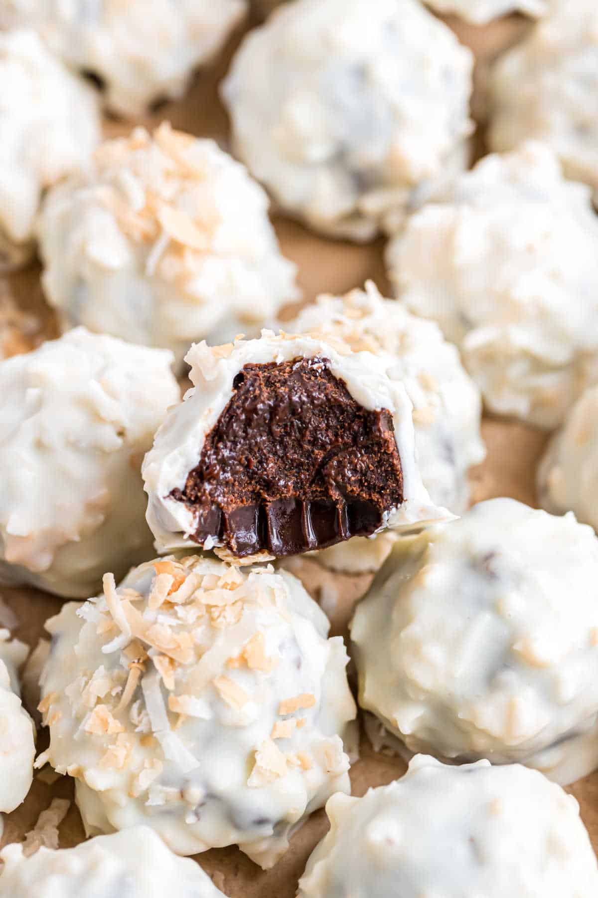 Coconut truffles with a dark chocolate filling.