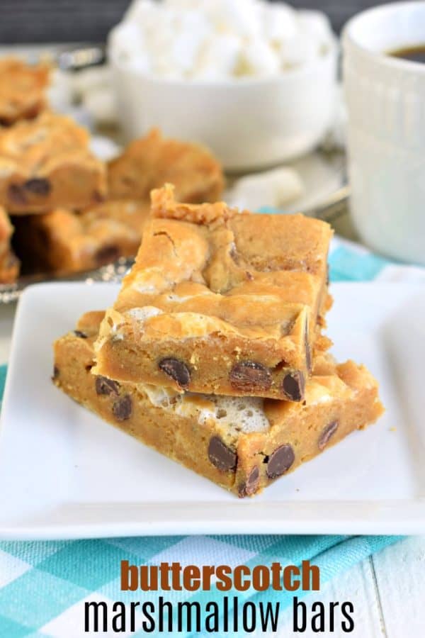 Stack of two butterscotch marshmallow bars on a white plate.