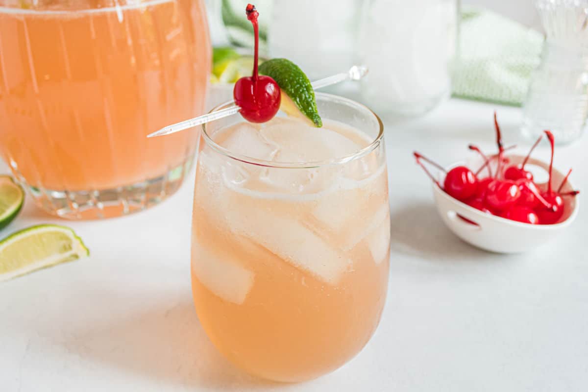 Cherry beer margarita in a stemless wine glass.