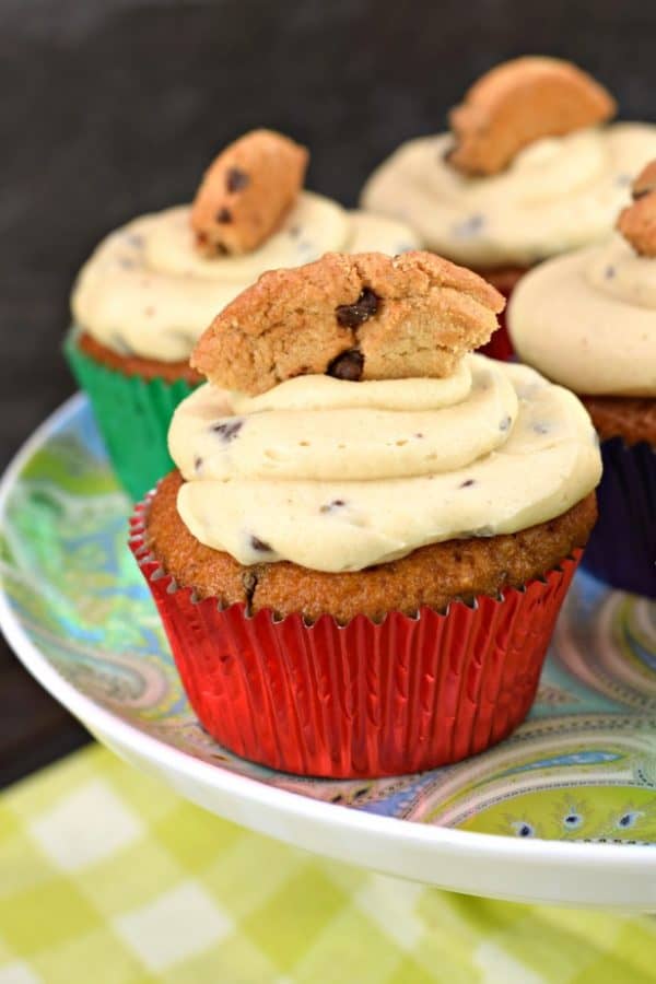 Chocolate Chip Cupcake with cookie dough frosting on a cake plate