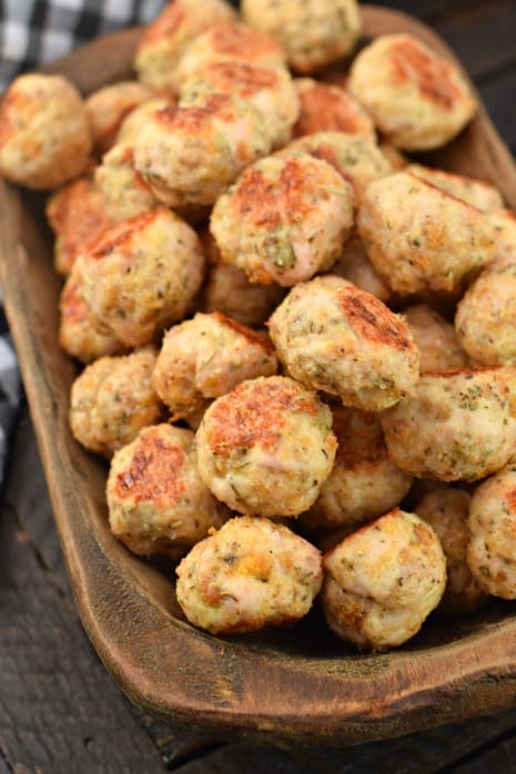 Turkey Meatballs in a wooden bowl, baked and browned.