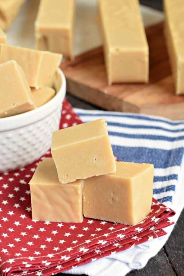 Peanut Butter Fudge stacked on red napkin with white stars