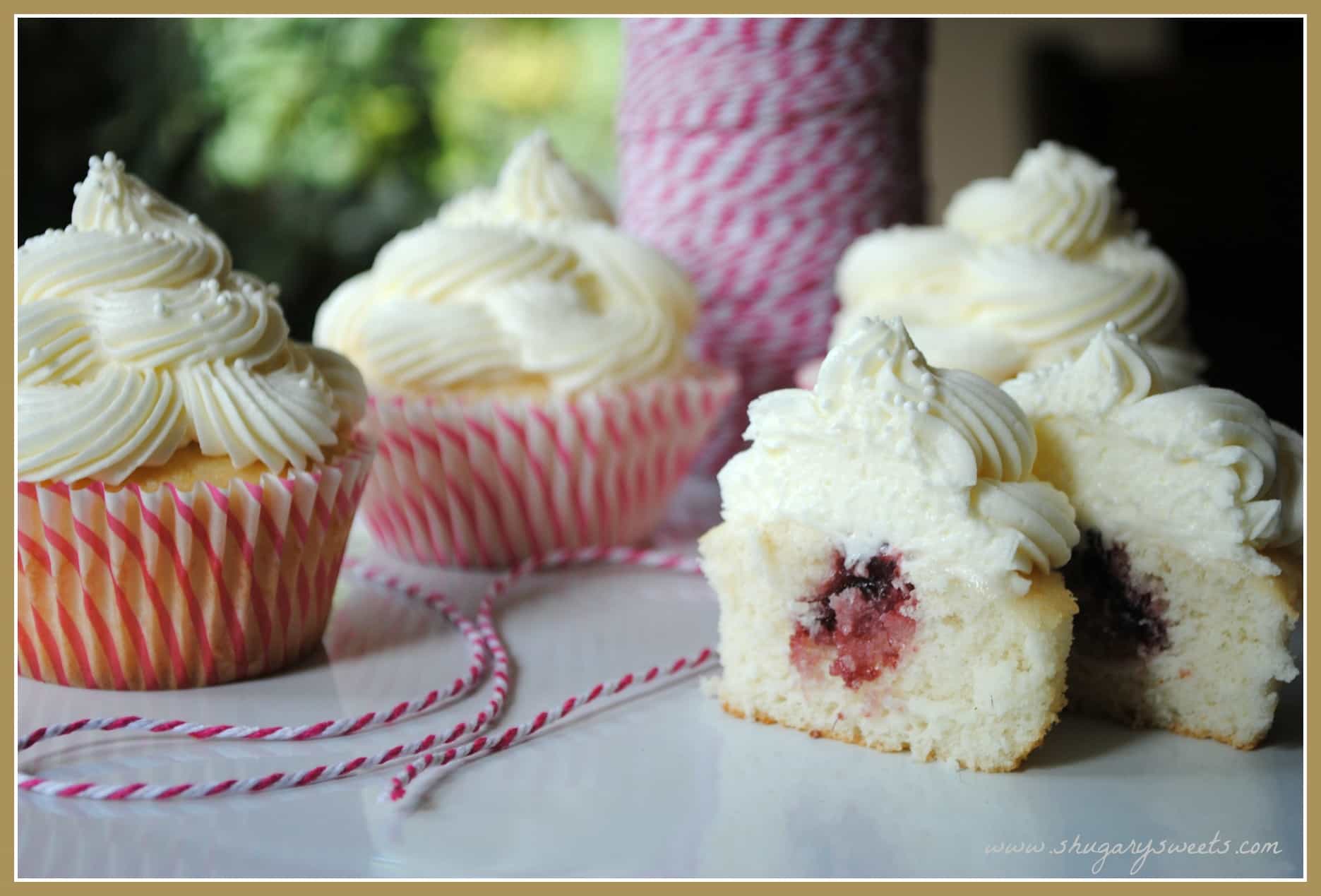 Almond Wedding  Cake  Cupcakes with Raspberry Filling  