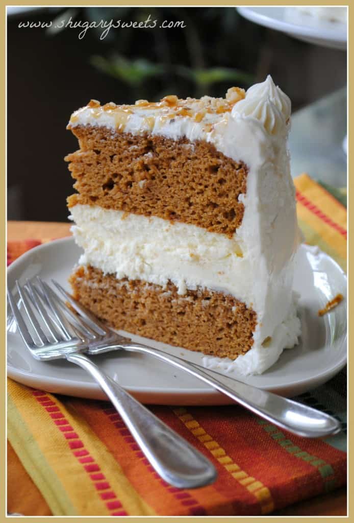 Pumpkin Cheesecake Cake: two layers of delicious pumpkin cake with a creamy cheesecake center. Frosted with cream cheese frosting!