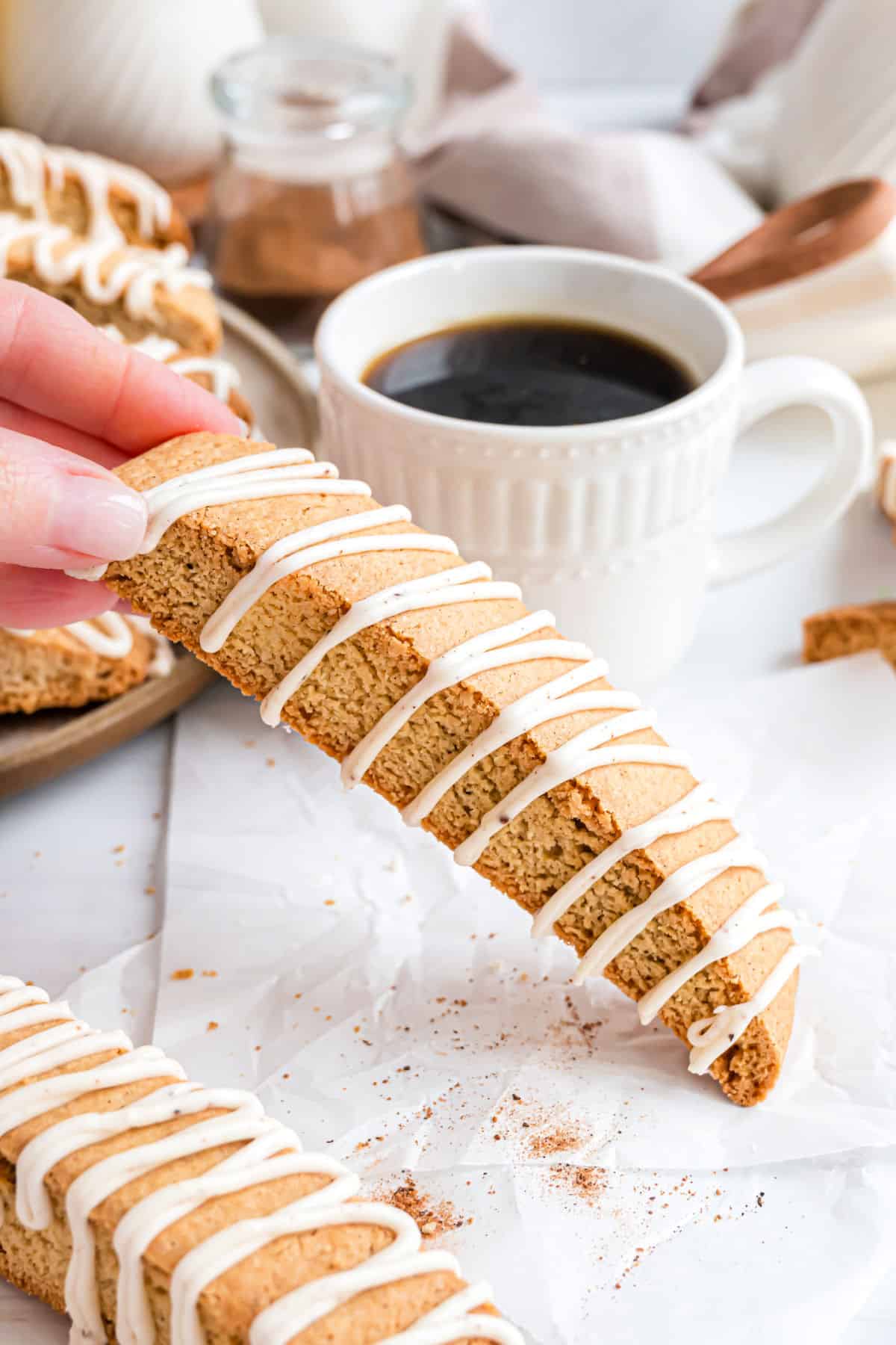 Eggnog biscotti with a mug of black coffee.