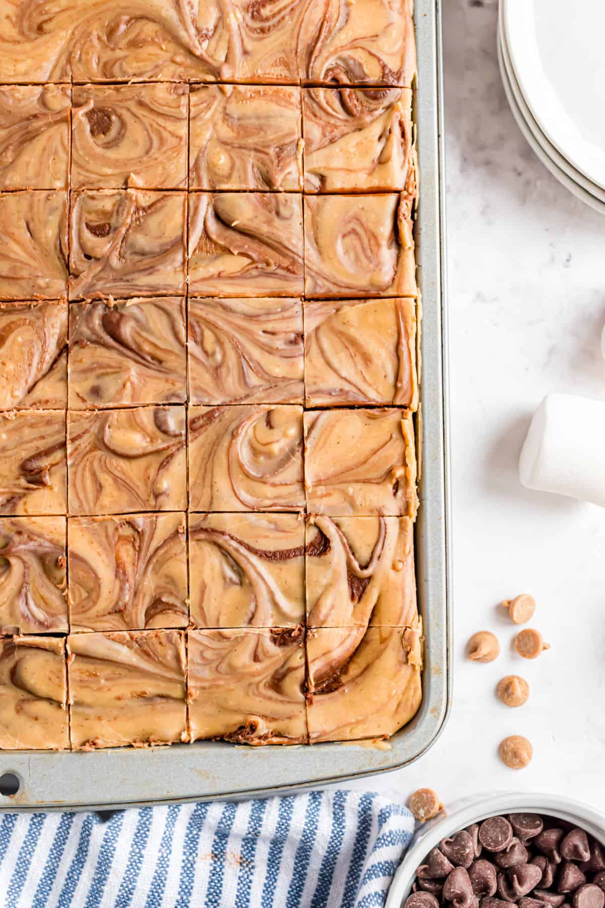 Chocolate peanut butter fudge swirled in pan.