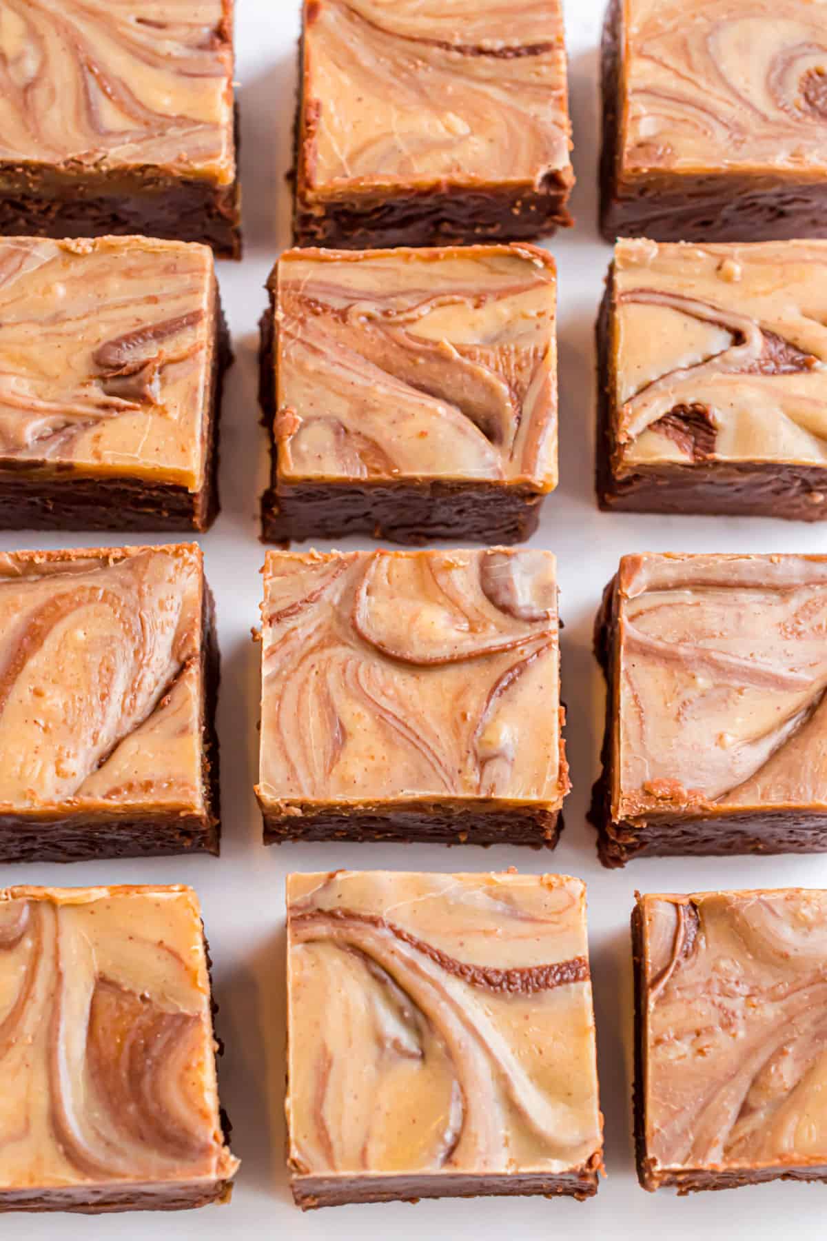 Squares of chocolate peanut butter fudge.