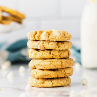 Delicious Lemon Cookies get a boost of extra crunch from lemon Oreos! Chewy lemon cookies with white chocolate chips, these are such a fun and easy treat to bake for family and friends!