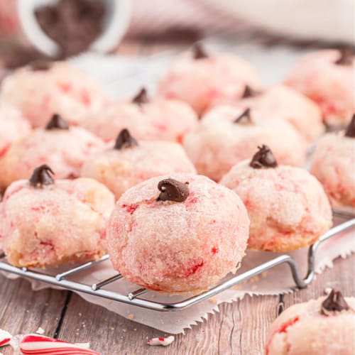 Peppermint Puff Cookies combine the best parts of a classic cookie with the best parts of a smooth buttery peppermint candy. Add a chocolate chip for sweetness and you have my Grandma's favorite Christmas treat.