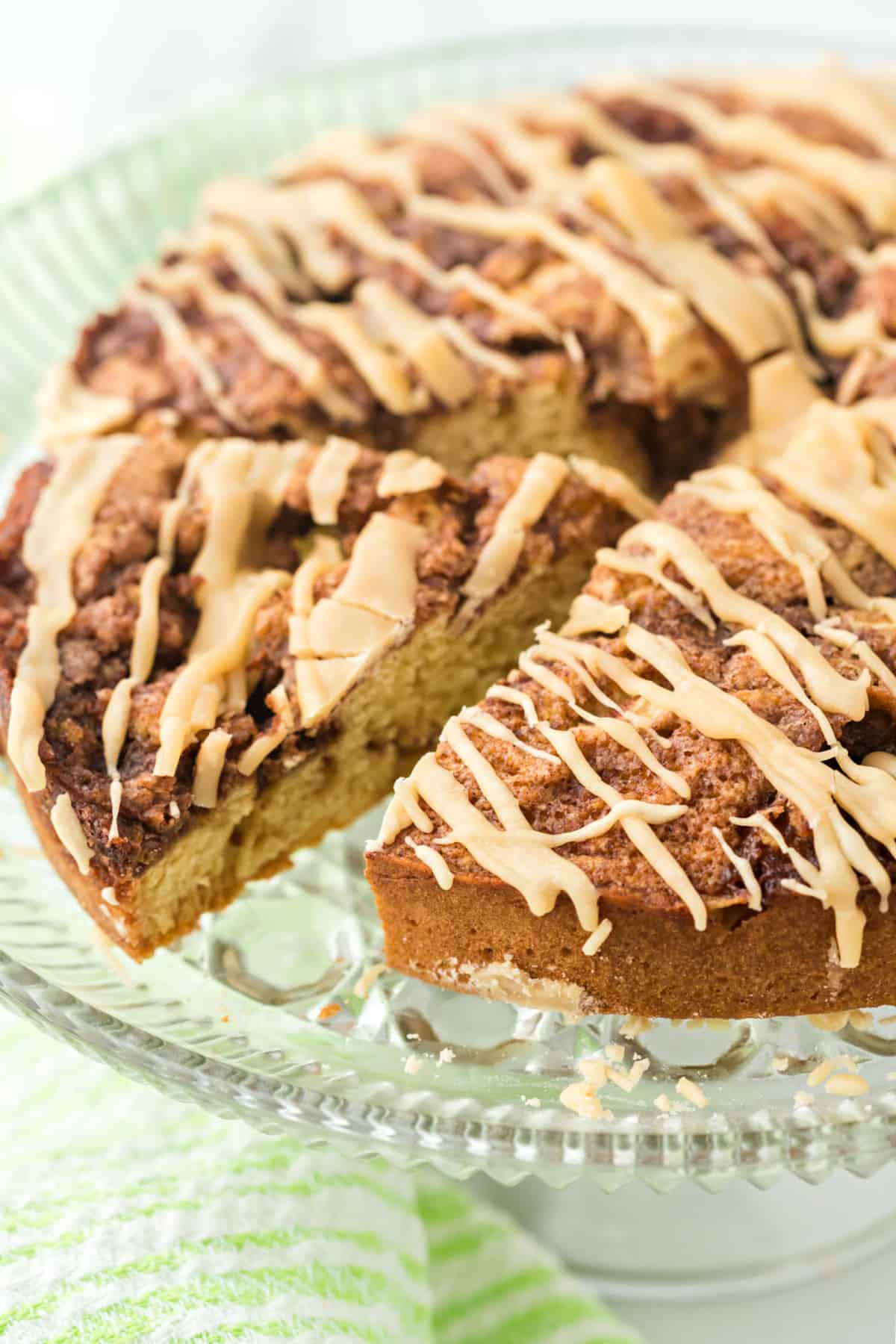 Apple coffee cake with caramel glaze.