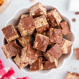 Kit kat bites in a white serving bowl.