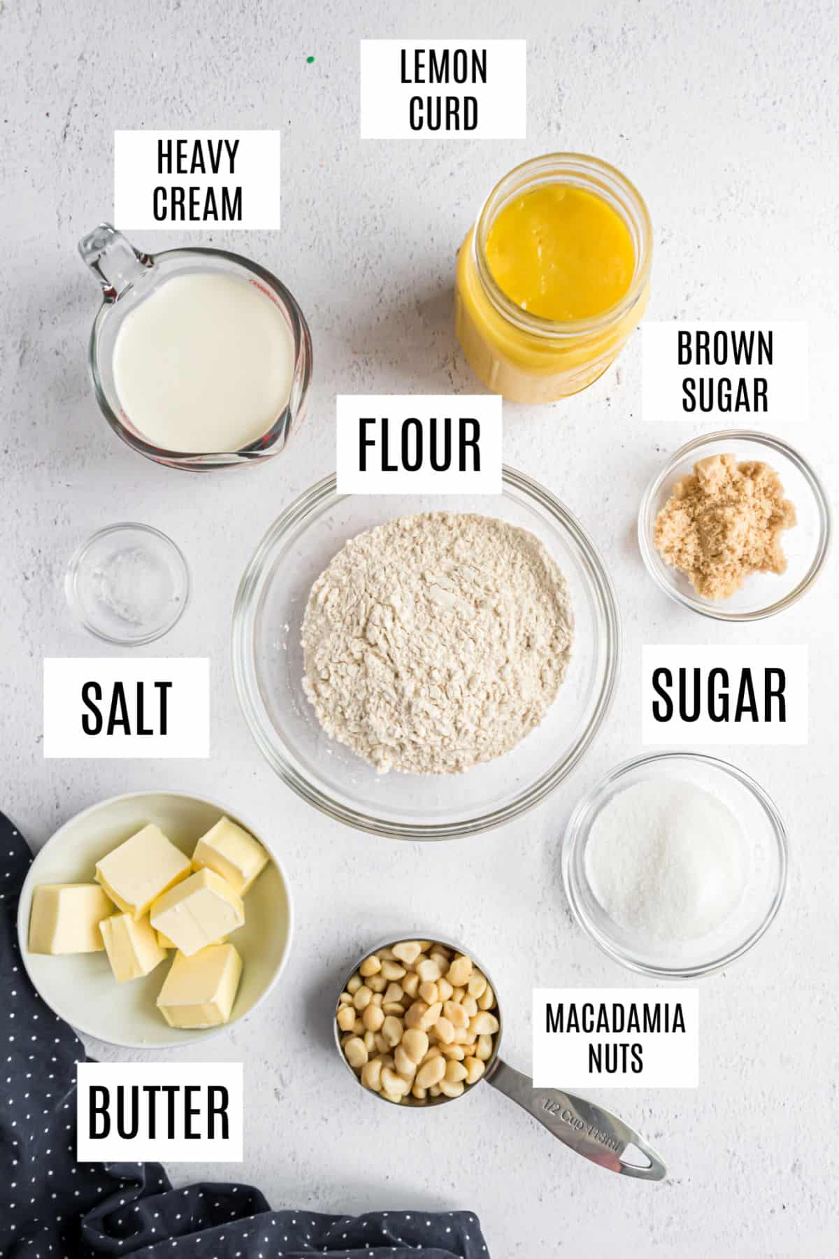 Lemon tart ingredients in small individual bowls.