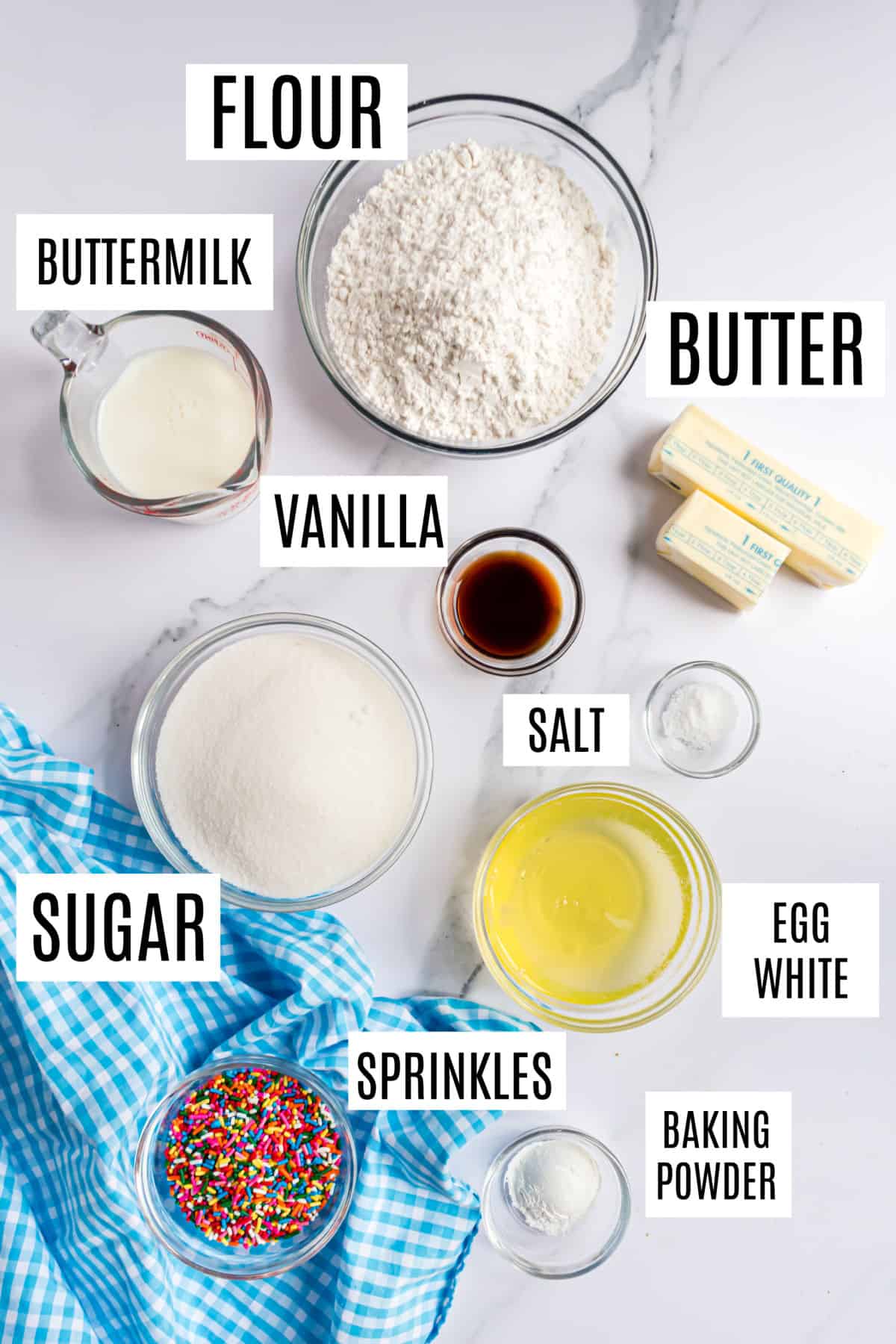Ingredients needed to make funfetti cupcakes.