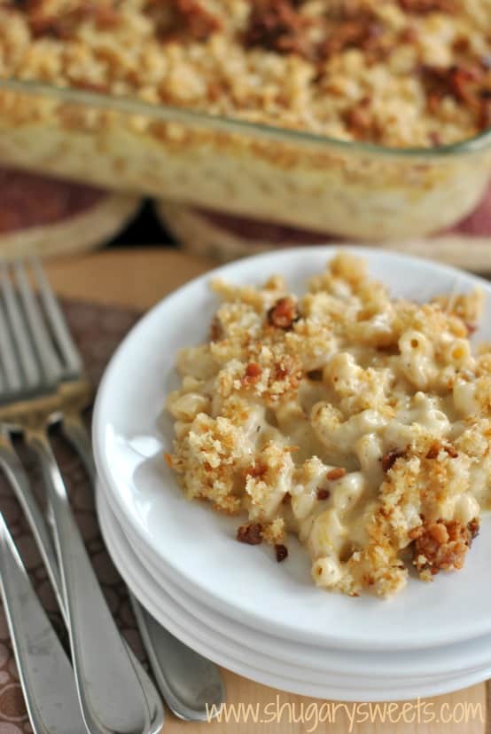 Gouda macaroni and cheese served on small white plate.