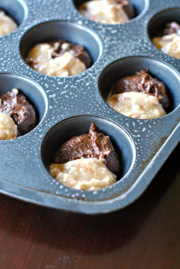 Chocolate and Banana in one tasty bite! These Chocolate Banana Muffins are delicious and freezer friendly.