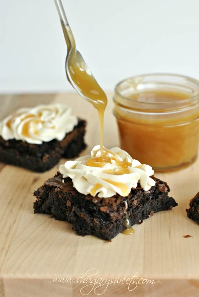 Chocolate brownies with homemade caramel sauce and salted caramel frosting
