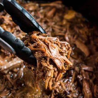 Another easy dinner recipe! Shredded Beef made in the slow cooker with balsamic glaze is perfect when you crave comfort food but don't want to turn on the oven.