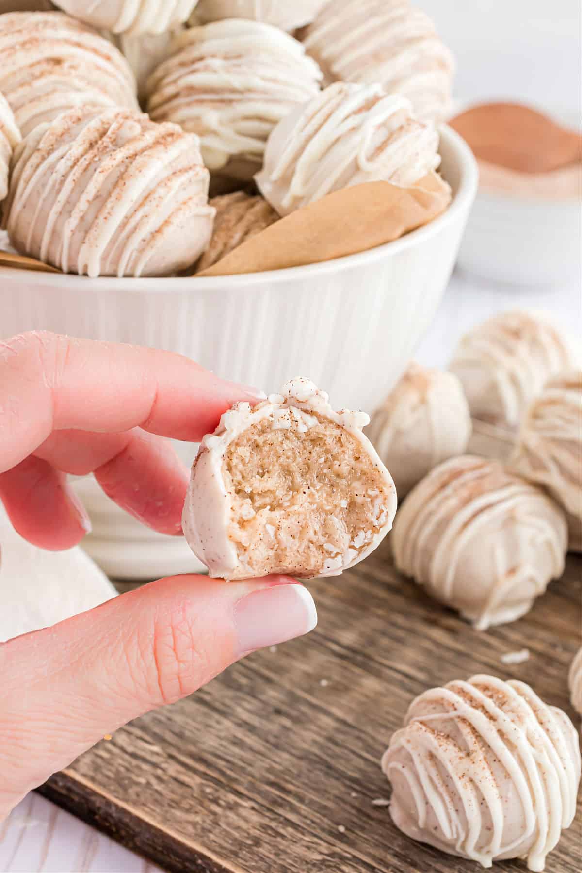 Bite taken out of snickerdoodle truffles.