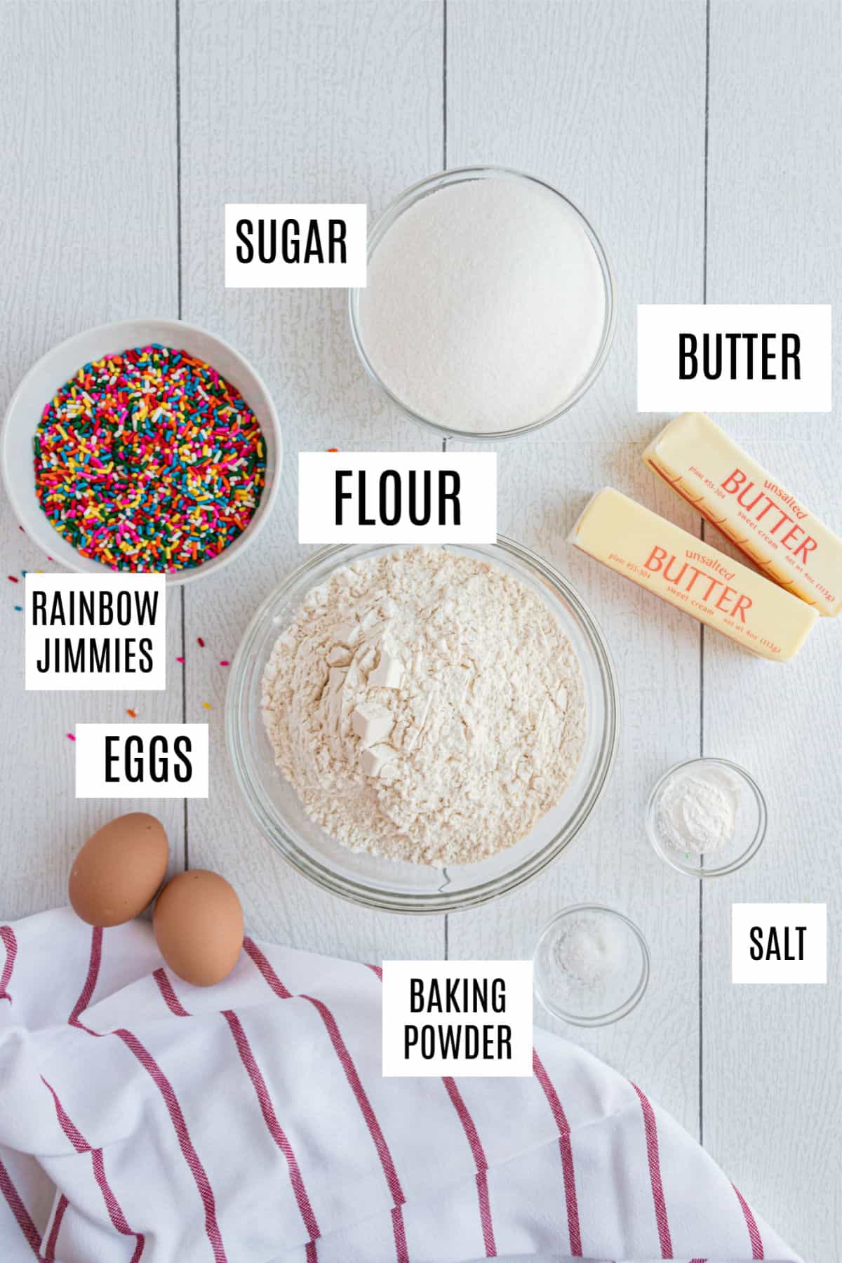 Ingredients needed to make funfetti cookies, including colorful sprinkles.