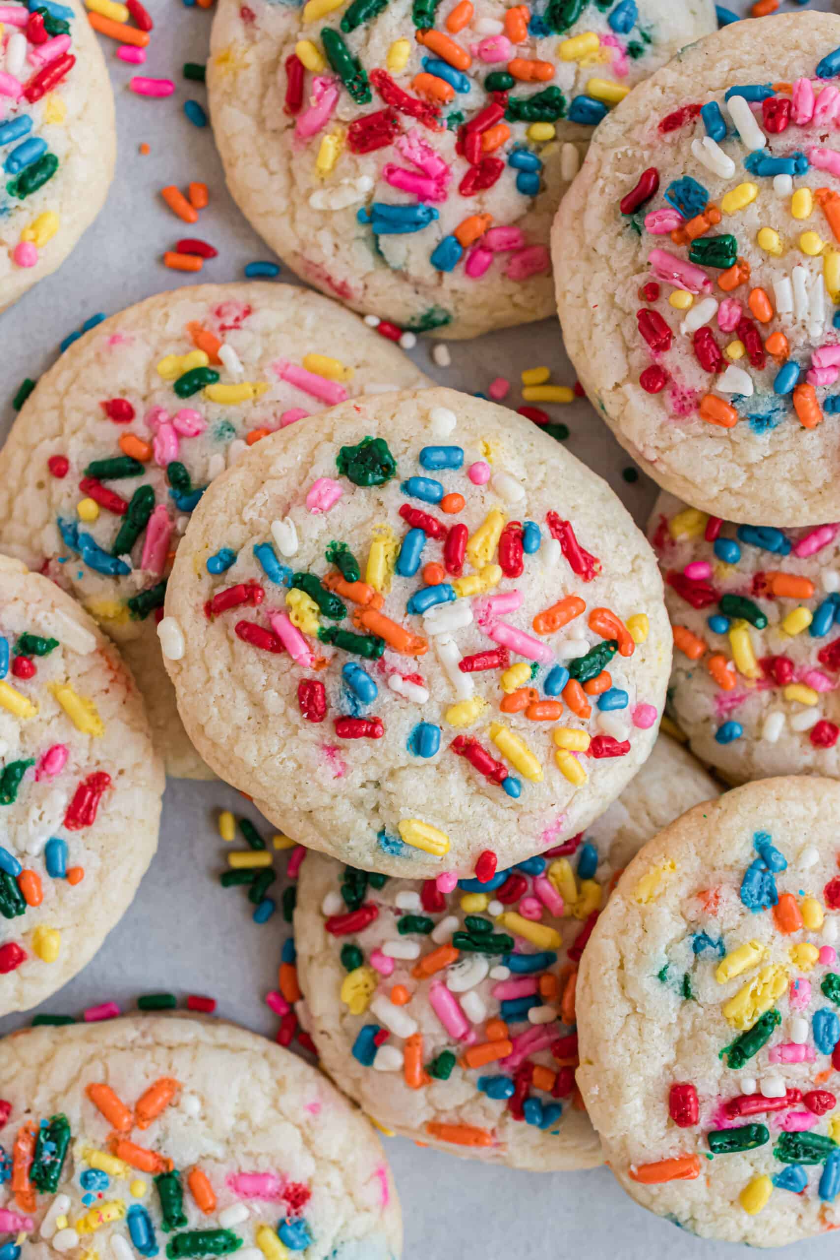 Funfetti cookies stacked on eachother.