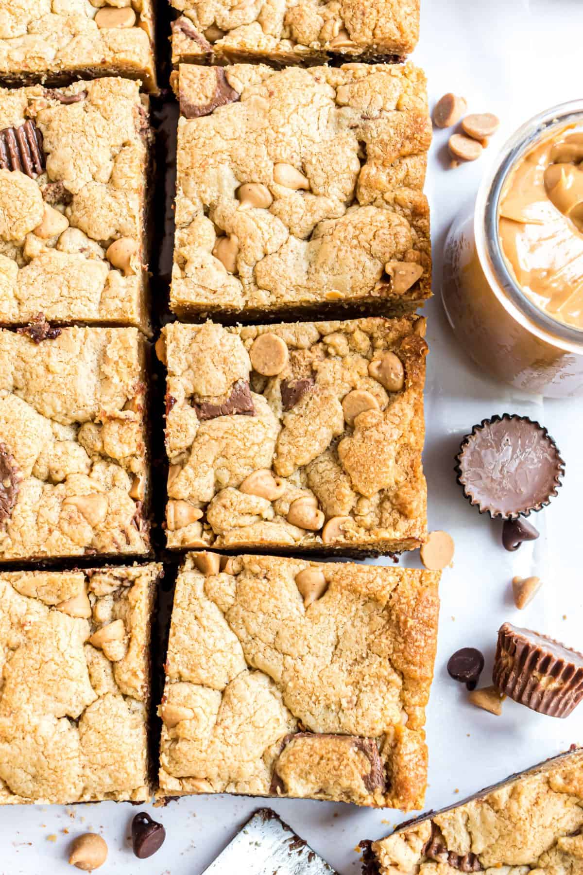 Peanut butter brookie bars cut into large squares.