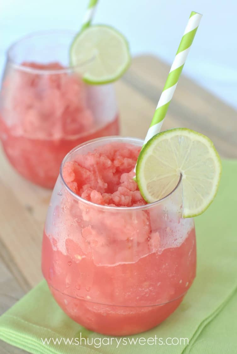 Watermelon slush with a lime slice garnish.