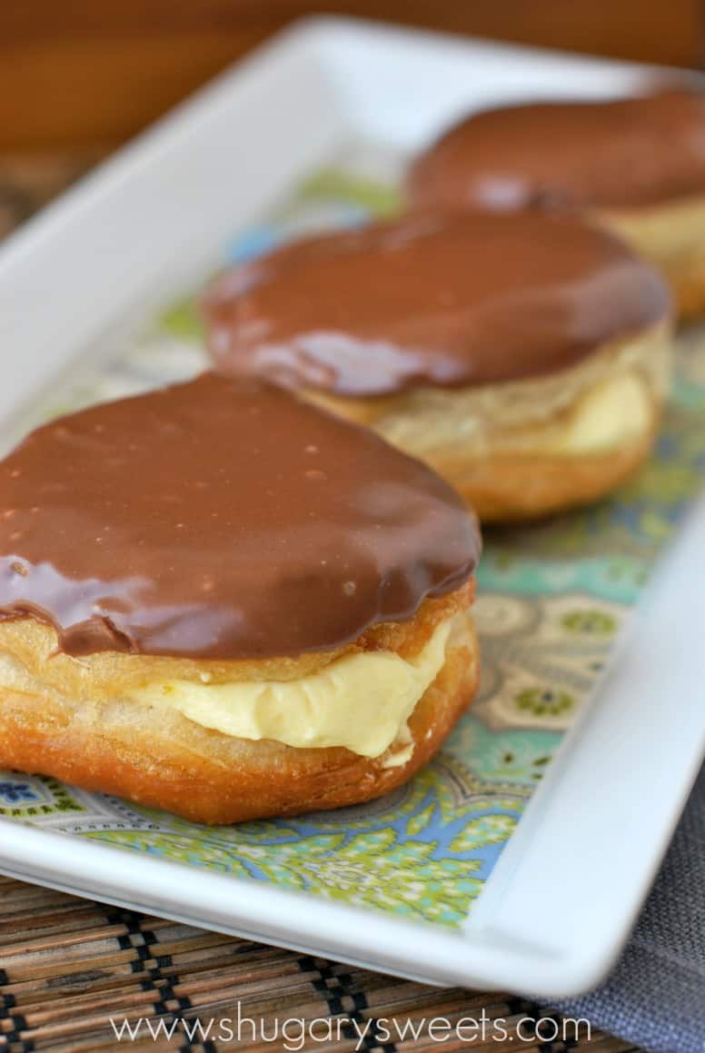 Tray of boston cream donuts.