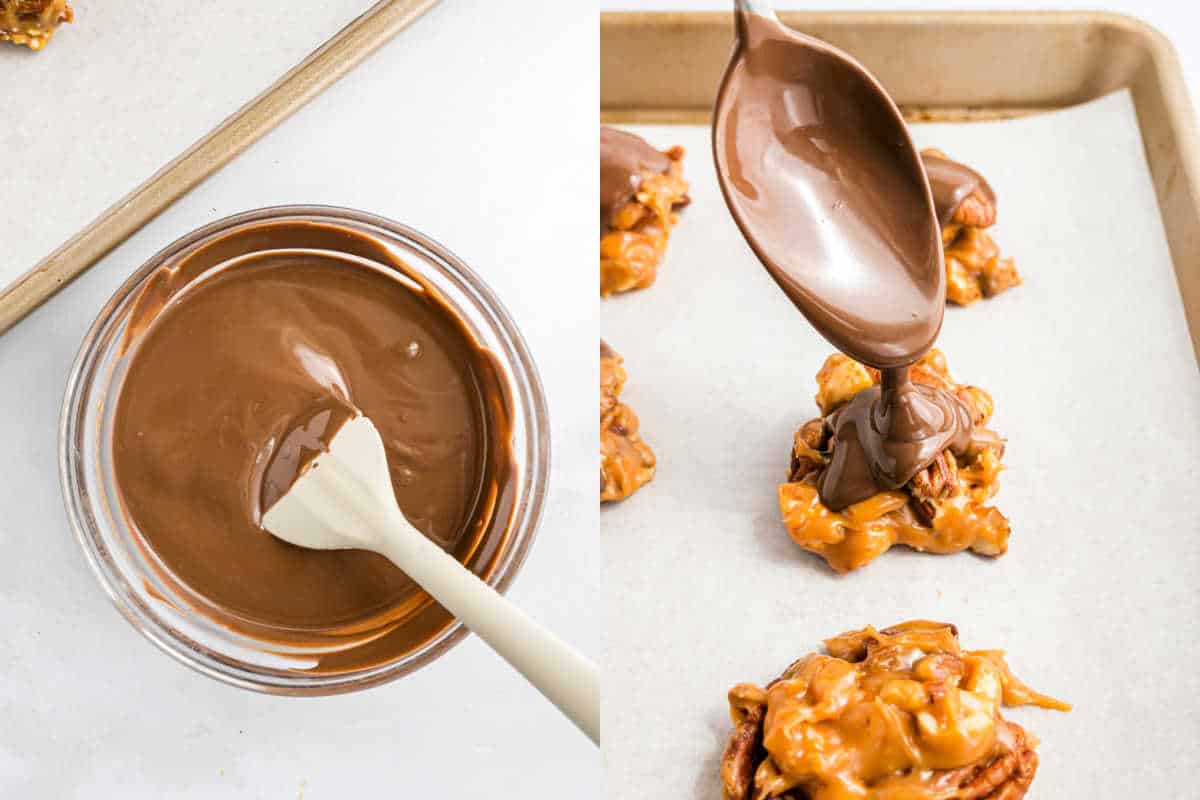 A bowl of melted chocolate and a spoon drizzling chocolate over caramel nut clusters on a baking tray.