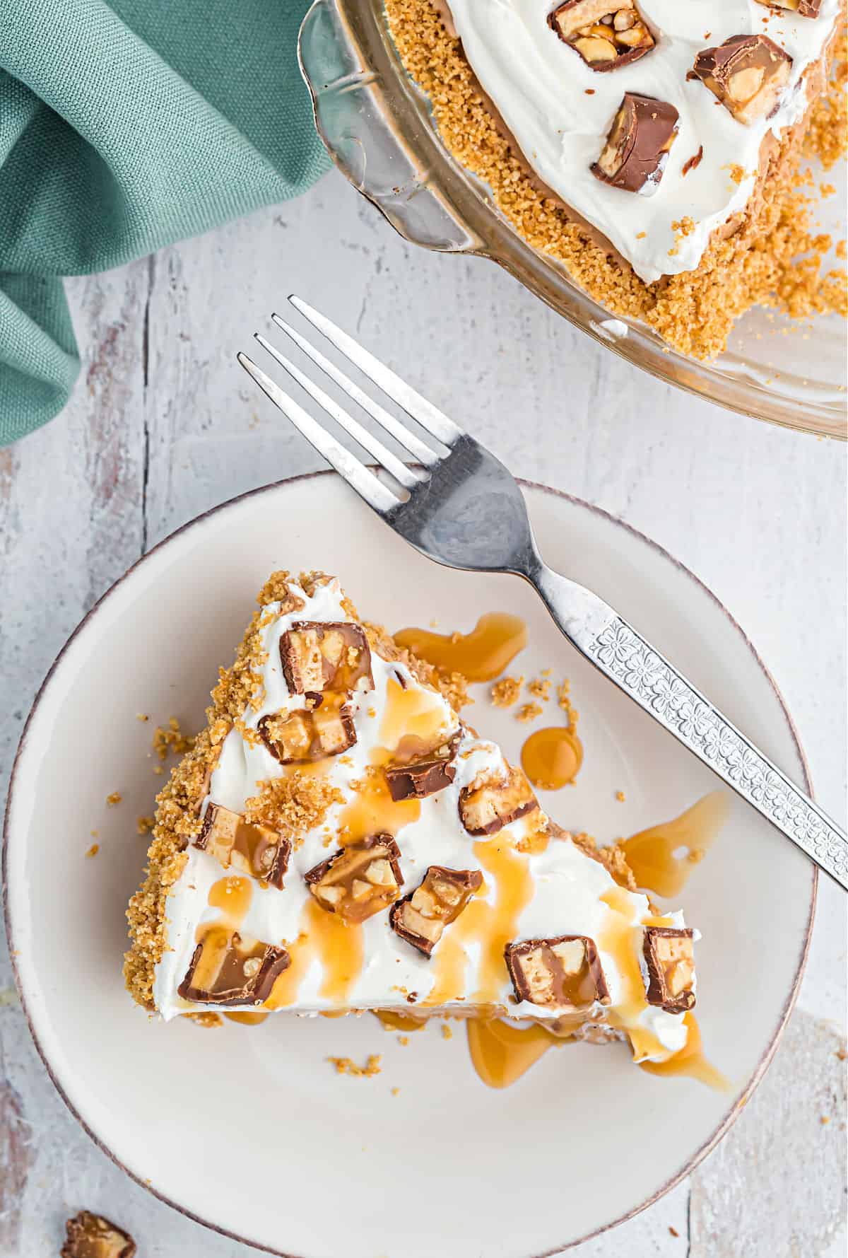 Snickers pie drizzle with caramel sauce when serving.