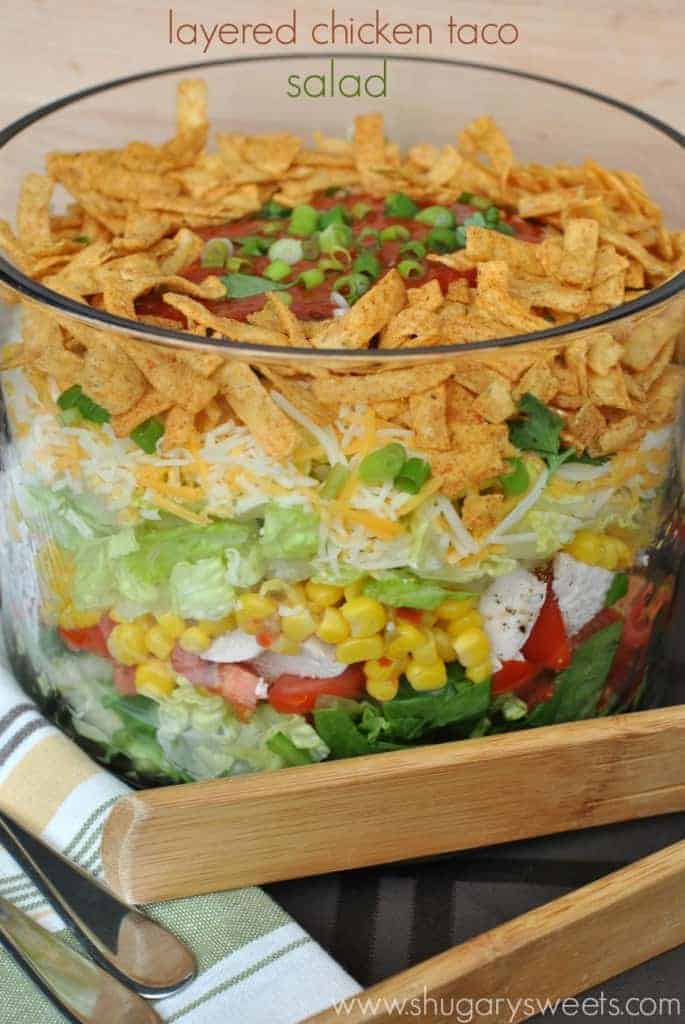 Layered Chicken Taco Salad: a delicious layered salad that's perfect for dinner! Bring to your next potluck or picnic too!