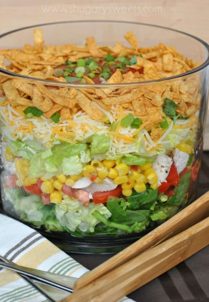 Layered Chicken Taco Salad: a delicious layered salad that's perfect for dinner! Bring to your next potluck or picnic too!
