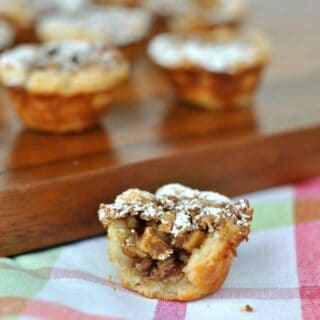 Apple pecan cookie with bite removed.