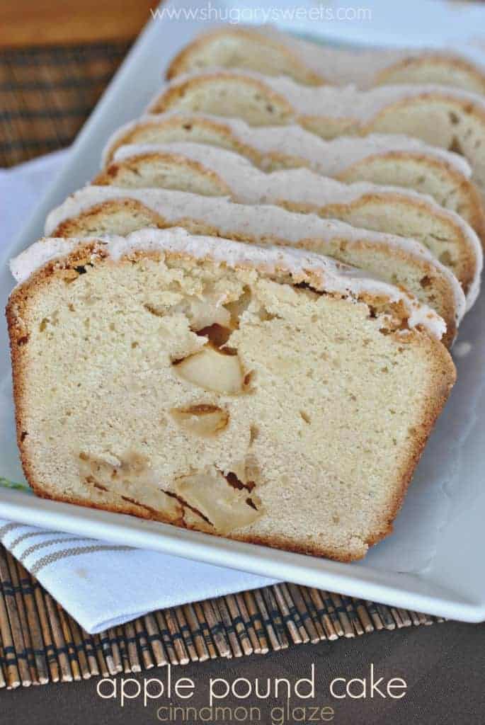 Apple Pound Cake: cream cheese pound cake filled with diced apples and topped with a cinnamon glaze! Slices of apple pound cake with cinnamon frosting on a plate.